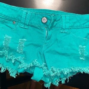 Teal denim shortie shorts